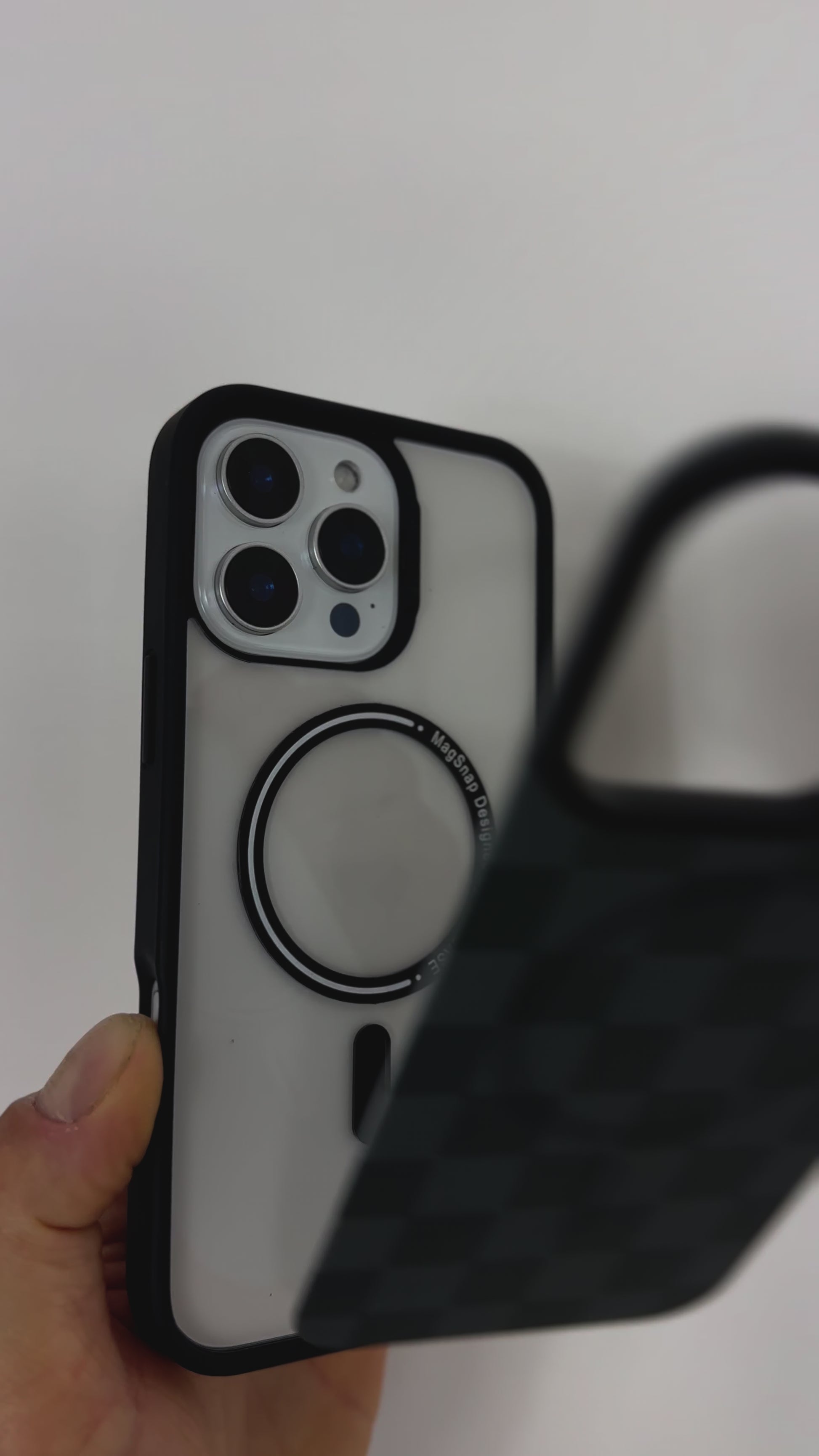 Tough MagSafe® iPhone Case with Black Checkered MagSnap™ cover, showing snap-on design and MagSafe® compatibility.