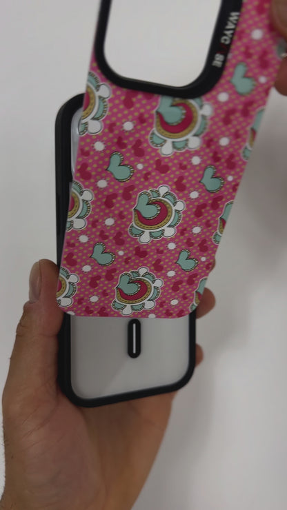 Video demonstrating the Tough MagSafe® iPhone Case with MagSnap™ Hearts design, highlighting the effortless interchangeability of magnetic back covers. The user showcases how the heart-patterned cover securely snaps on and off, emphasising customisable aesthetics and seamless MagSafe compatibility.