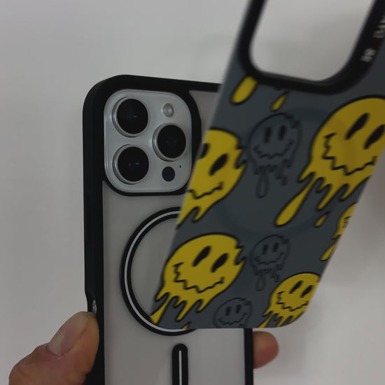 Video featuring the Tough MagSafe® iPhone Case with MagSnap™ Melted Emoji design. Highlights the bold, drippy emoji artwork on a magnetic back cover that snaps on and off easily. Demonstrates strong MagSafe® compatibility and playful, swappable customisation.