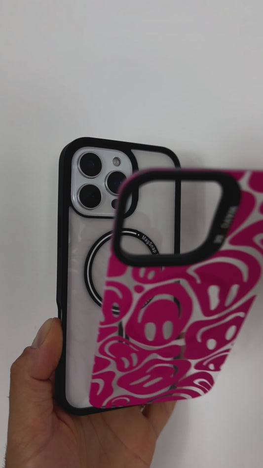 Video showcasing the Tough MagSafe iPhone Case in MagSnap pink, featuring an abstract faces design. SHowcasing the product, highlighting its vibrant colour, artistic pattern, and MagSafe compatibility.
